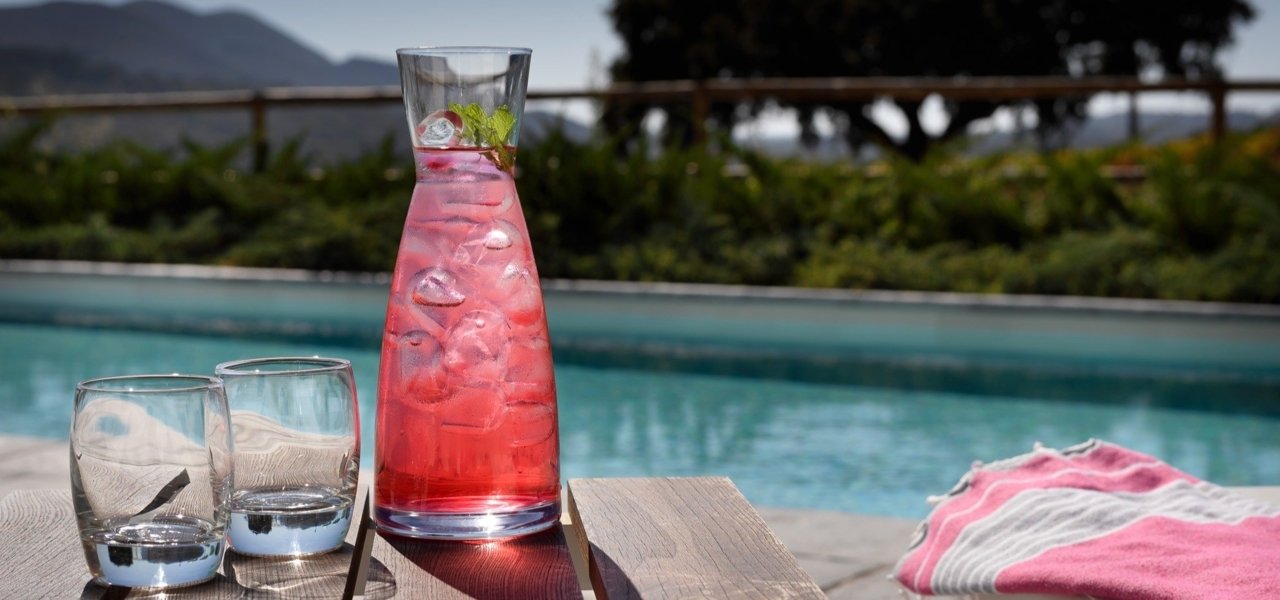 Pool side with cocktails - Wine Paths